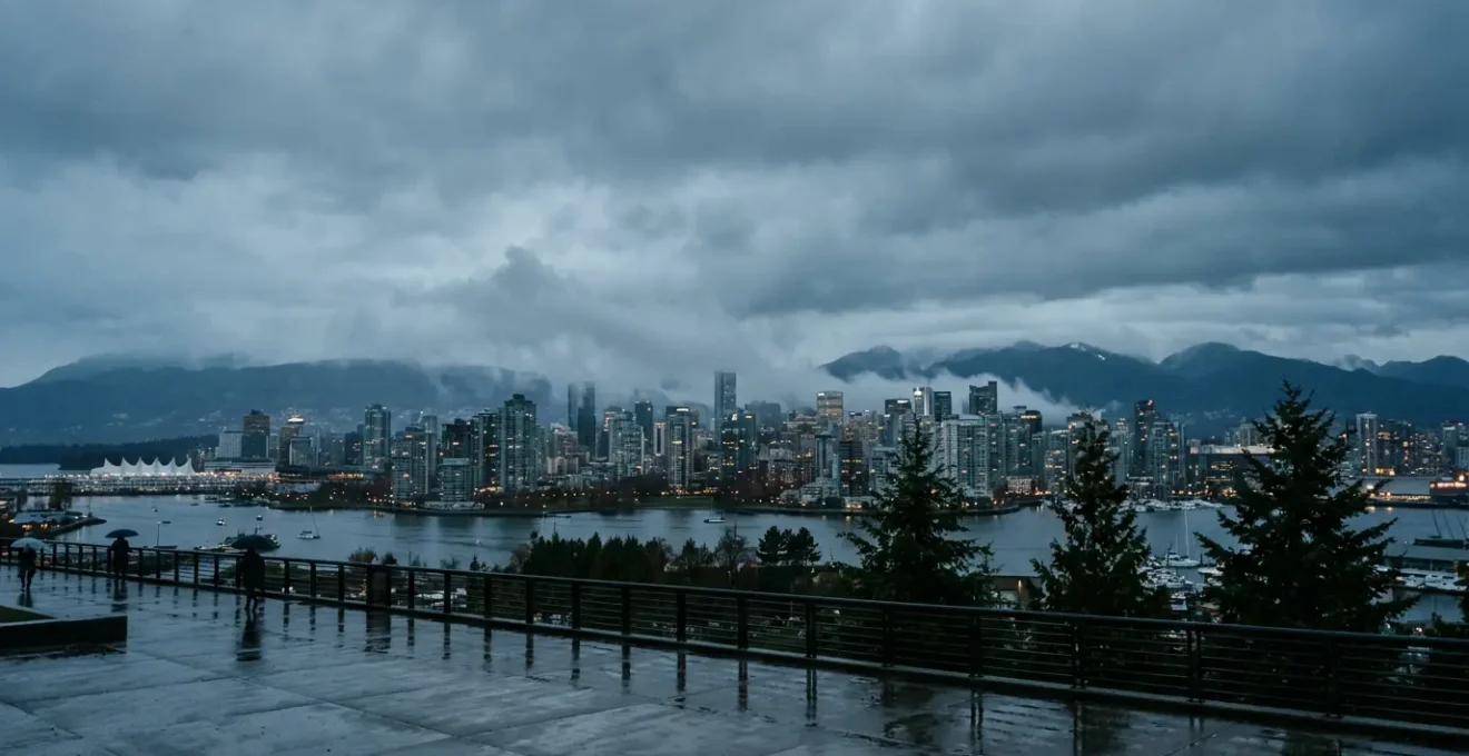 Moody Vancouver waterfront scene in November with rain-soaked streets reflecting city lights under overcast skies
